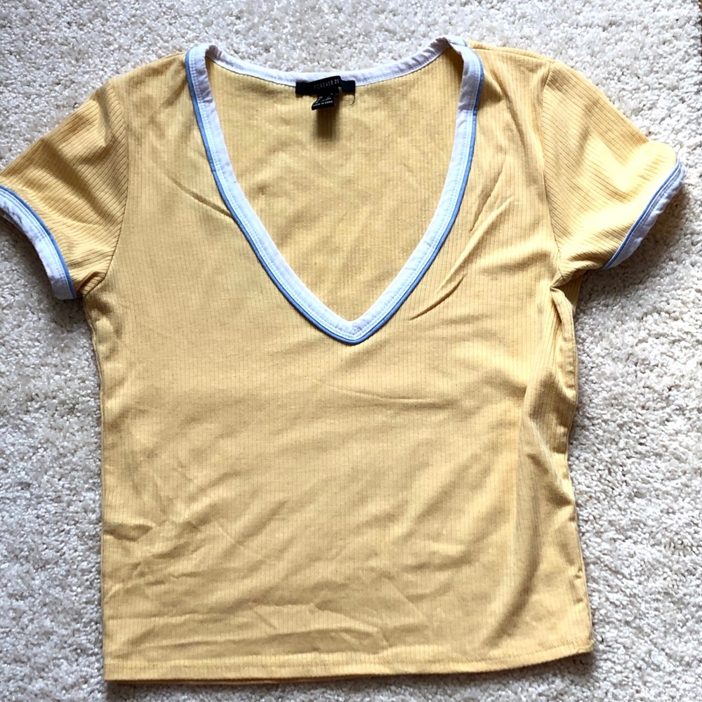 Yellow cropped shirt